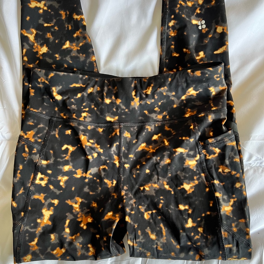 Sweaty Betty Zero Gravity 7/8 running leggings in brown tortoise shell size M